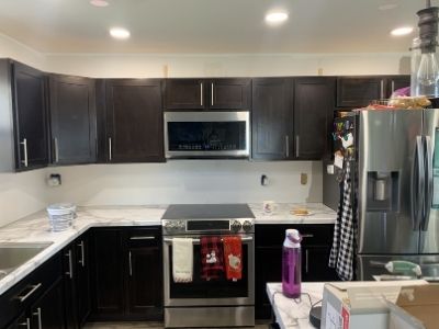 the bare walls before we installed subway tile backsplash