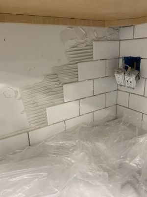 comb through glue to install subway tile backsplash