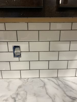 polish the subway tile backsplash the next day