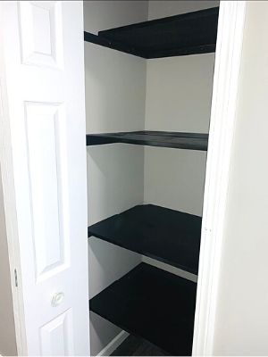 finished diy linen closet shelves