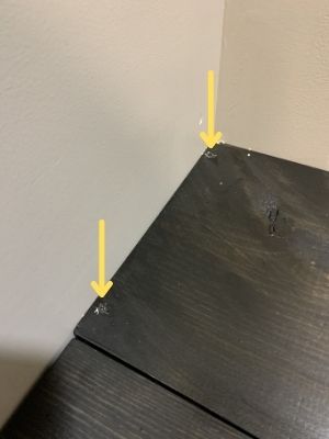 screw the diy linen closet shelves into the supports