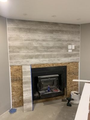 glue wall panels on fireplace
