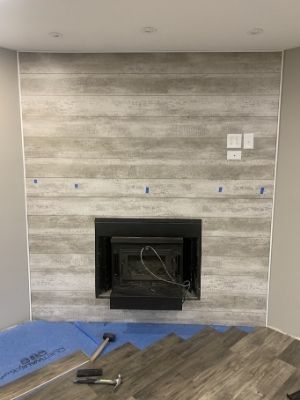 diy fireplace makover on a budget with decorative wall panels