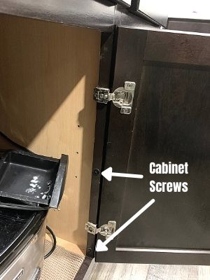 are kitchen islands attached to the ground - screws attaching cabinets together