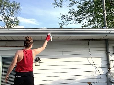 how to paint gutters downspouts - spray two coats of clear topcoat