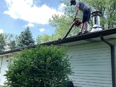 how to paint gutters downspouts - clean gutters with leaf blower