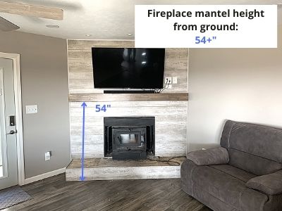 how high should a fireplace mantel be above the ground