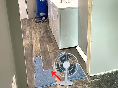 how to dry laminate flooring with water under it - set up a fan