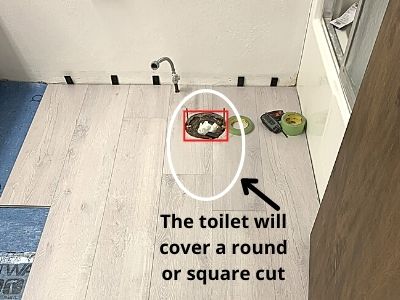 how to cut and install laminate flooring under a toilet