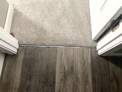 how to install laminate transition strip in concrete